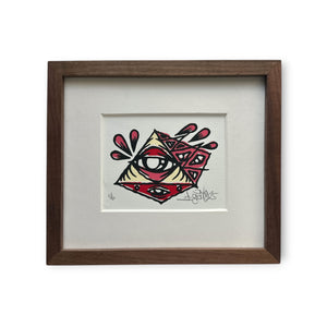 Eye Gato cream and red pyramid painting on white rives paper, mounted on white boards in a brown walnut custom frame.