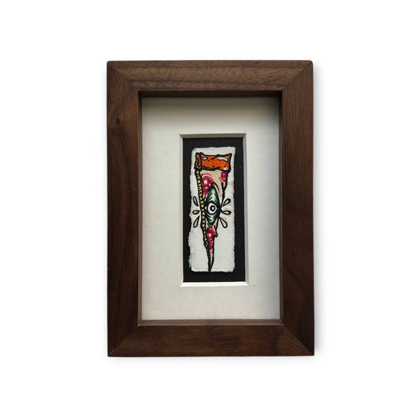 Pizza with orange crust, beige and red fill and a green eye with white iris. Painted on white rives paper, mounted and custom framed with brown walnut wood. 