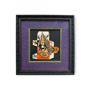 Original framed mixed media Eye Gato artwork painted on vintage film packaging, featuring the pyramid eye design in orange, black, and cream tones.