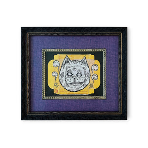 Original black framed mixed media Eye Gato artwork painted on vintage film packaging, featuring the pyramid eye design in yellow, black, and white.