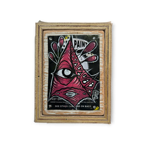 Red pyramid Eye Gato character painted on reconstructed spray can aluminum, remounted on reclaimed street sign wood.
