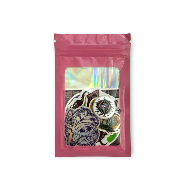 Eye Gato sticker pack with various vinyl character stickers and a white button.