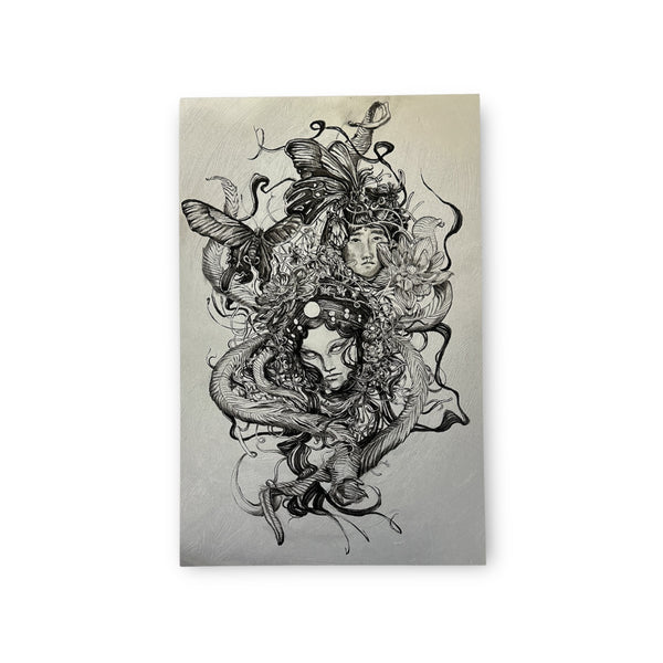 High quality black and white print of two faces intertwined with butterflies and other nature elements in a dream-like landscape.